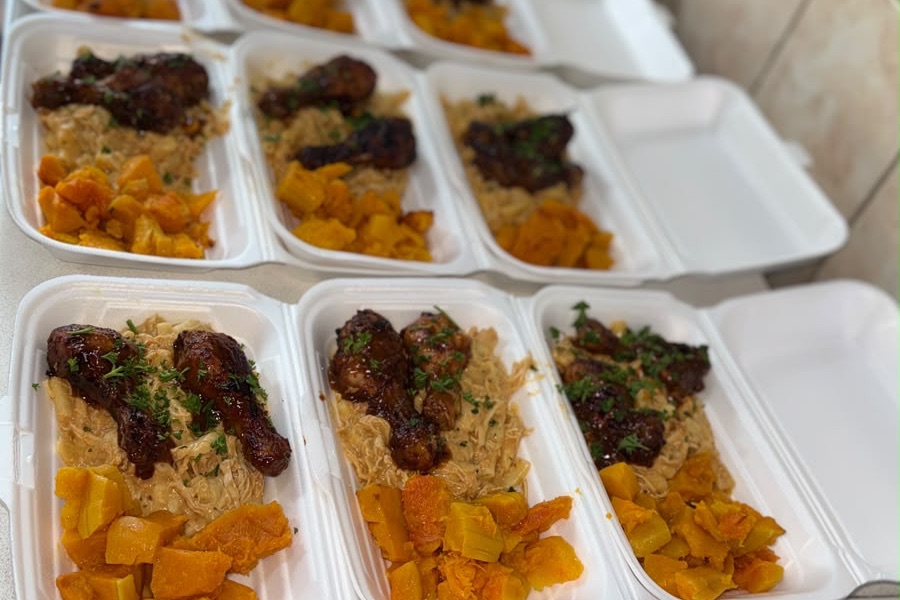 Individually packed catering meals laid out for an event